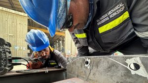 Workers at a factory in Manama. Bahrain's government has launched a "smart factories" program to support private sector businesses