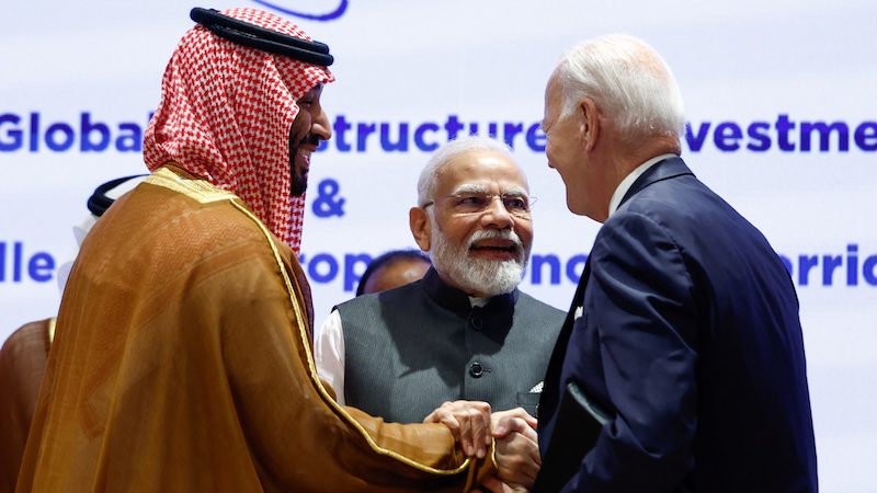 Saudi Crown Prince Mohammed bin Salman Al Saud, US President Joe Biden and Indian Prime Minister Narendra Modi shake hands at the G20 summit in New Delhi