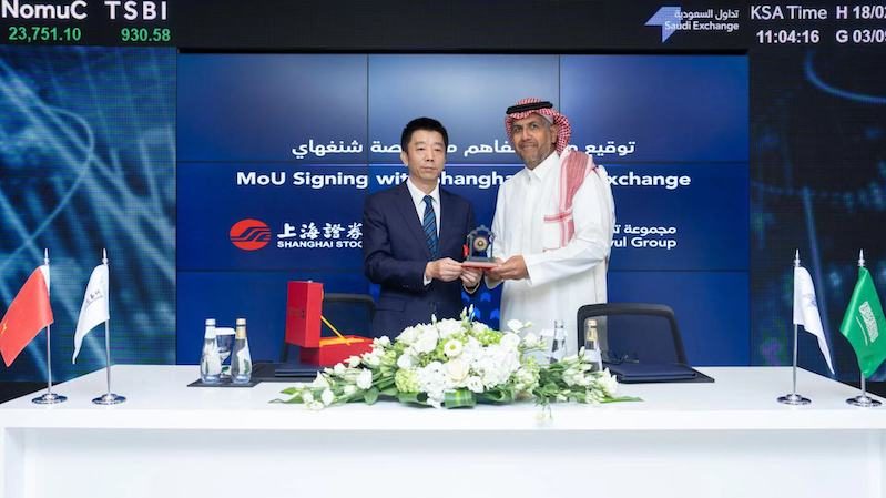 Shanghai Stock Exchange president Cai Jianchun and Saudi Tadawul Group CEO Khalid Abdullah Al-Hussan at the signing ceremony