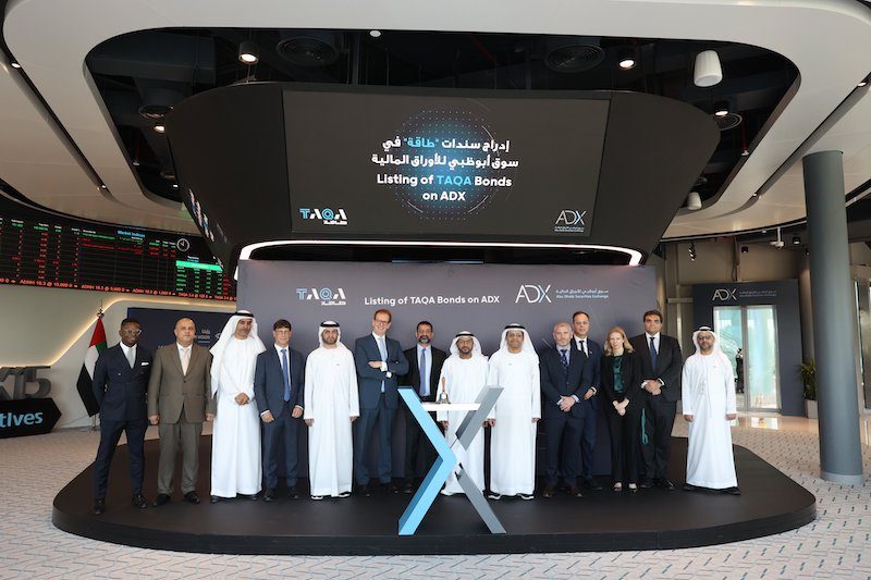 Taqa executives and ADX officials at the listing of Taqa's dual-tranche bonds in Abu Dhabi