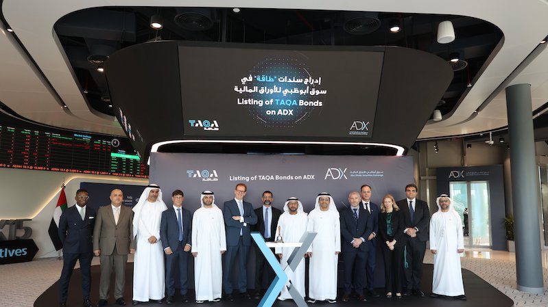 Taqa executives and ADX officials at the listing of Taqa's dual-tranche bonds in Abu Dhabi