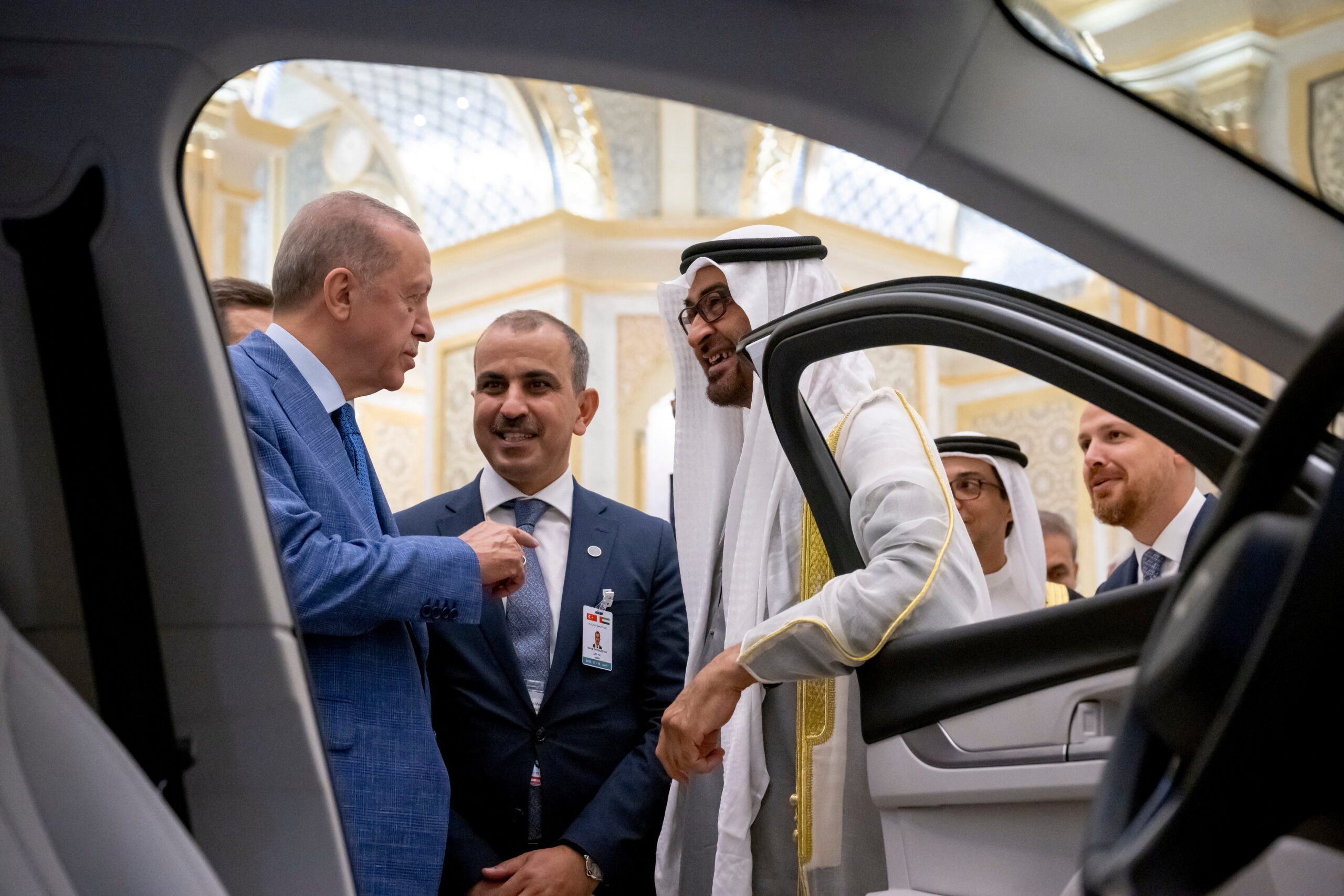 Turkish president Recep Tayyip Erdoğan and UAE president Sheikh Khaled inspect a Turkish Togg EV during President Erdoğan's visit to the UAE in July