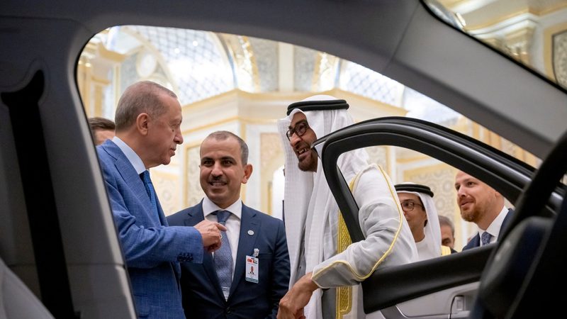 Turkish president Recep Tayyip Erdoğan and UAE president Sheikh Khaled inspect a Turkish Togg EV during President Erdoğan's visit to the UAE in July