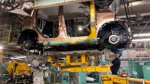 Workers at a Mitsubishi factory in Japan install an EV battery. Morocco has 70% of the world's phosphate, a vital material for batteries