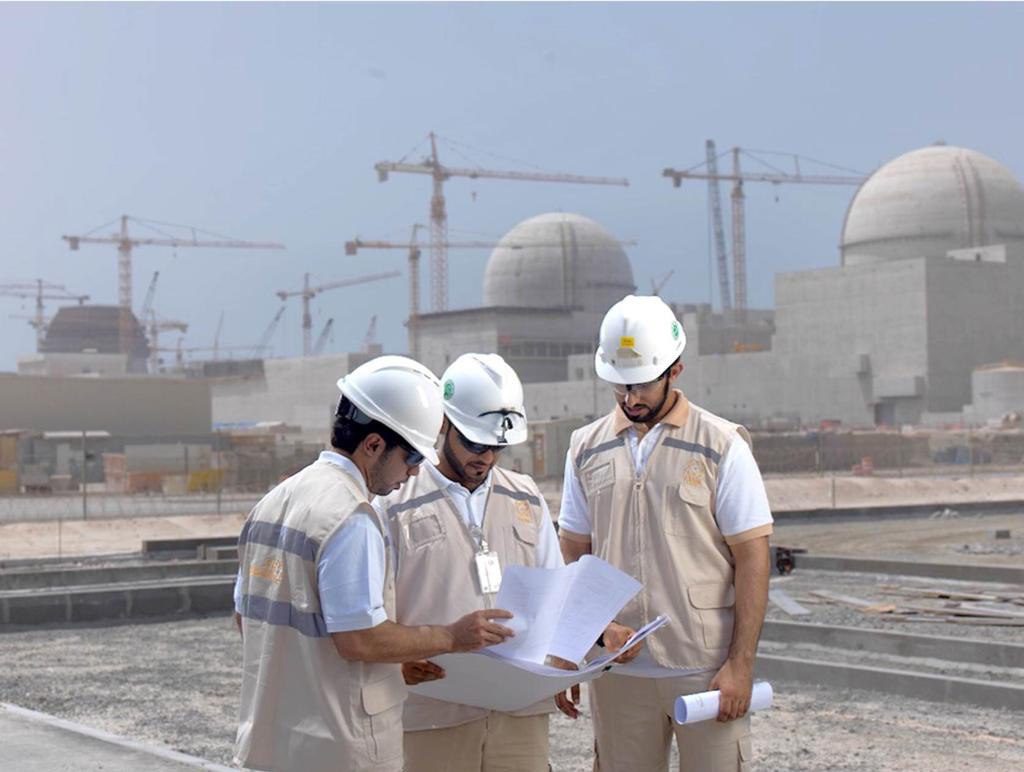 Workers at the Barakah Nuclear Plant in Abu Dhabi. Heat from the plant is used in the electrolysis process to produce hydrogen