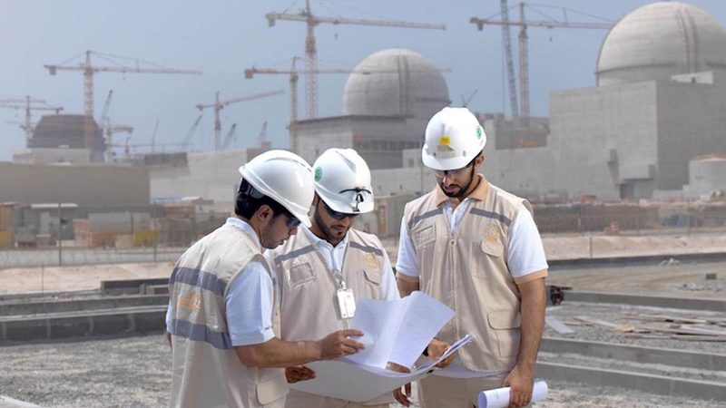 Workers at the Barakah Nuclear Plant in Abu Dhabi. Heat from the plant is used in the electrolysis process to produce hydrogen