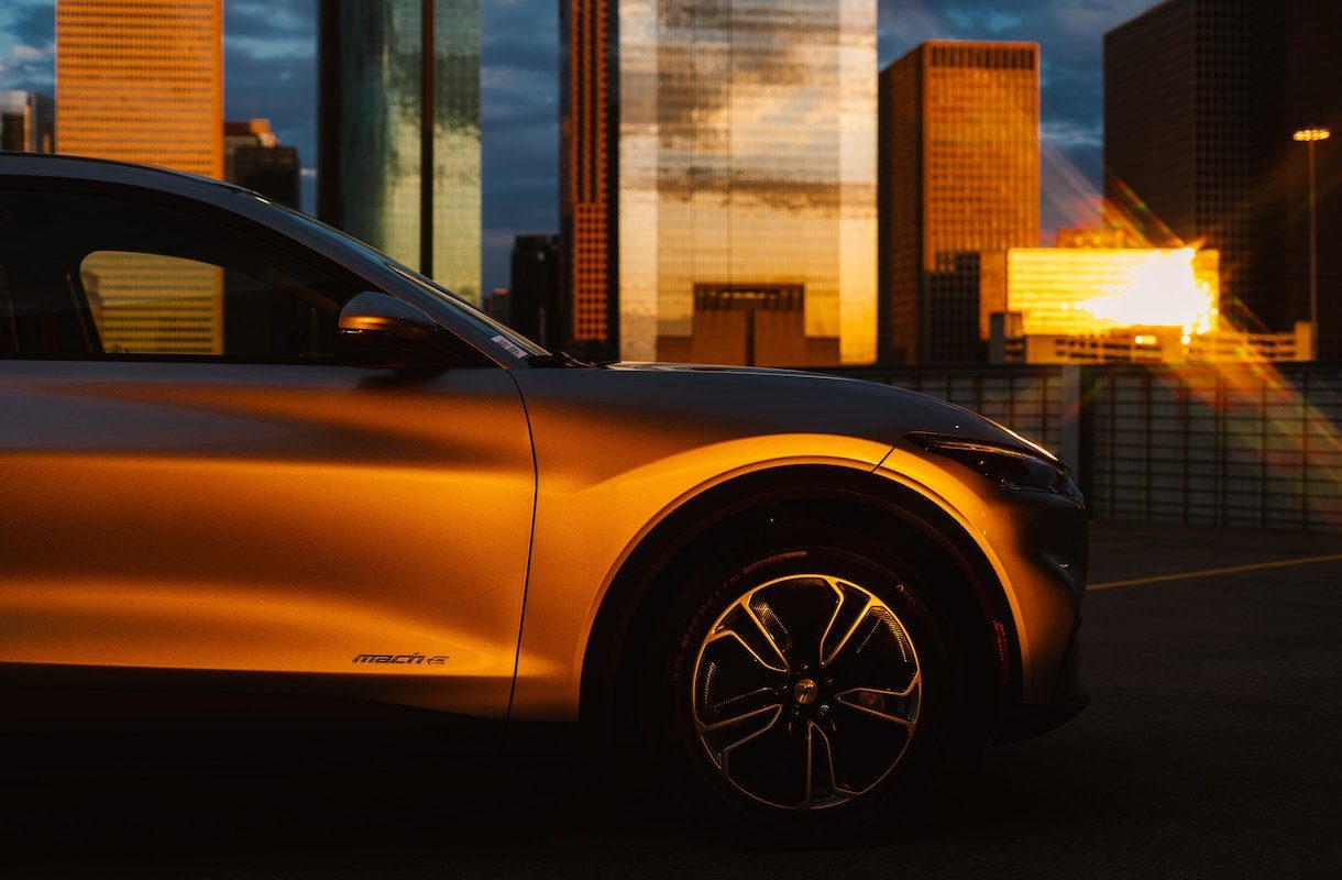 Ford Mustang Mach-E at golden hour electric vehicle in the sun