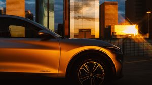 Ford Mustang Mach-E at golden hour electric vehicle in the sun