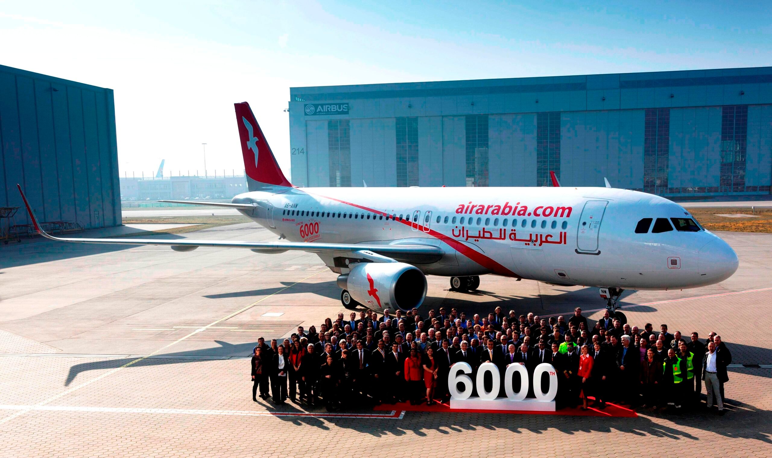 Air Arabia staff celebrating the delivery of the 6,000th Airbus. The low cost airline now plans to launch a route to London from the UAE