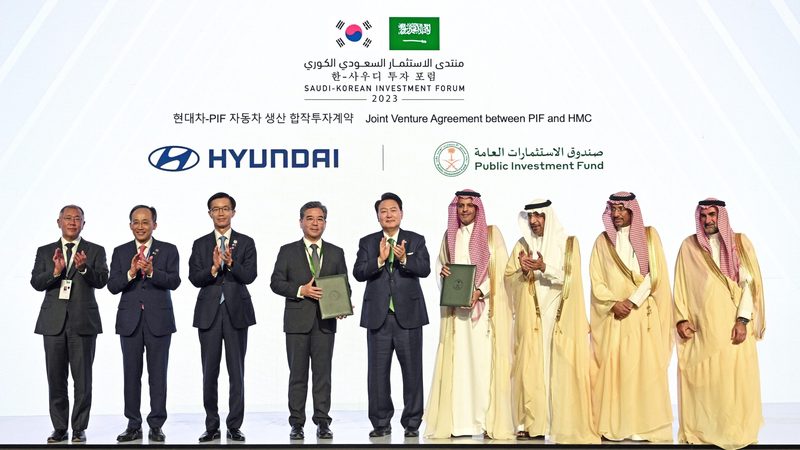 Hyundai and PIF officials at the signing ceremony for their venture