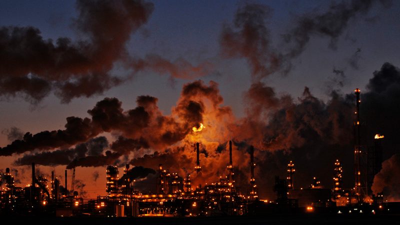 Petro-Canada's oil refinery glows at dusk in Edmonton