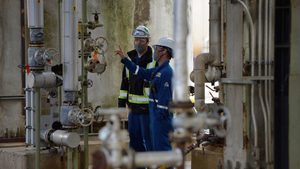 Workers at an oil refinery in British Columbia. New supply has opened up in Venezuela, Brazil and Guyana, as well as Canada