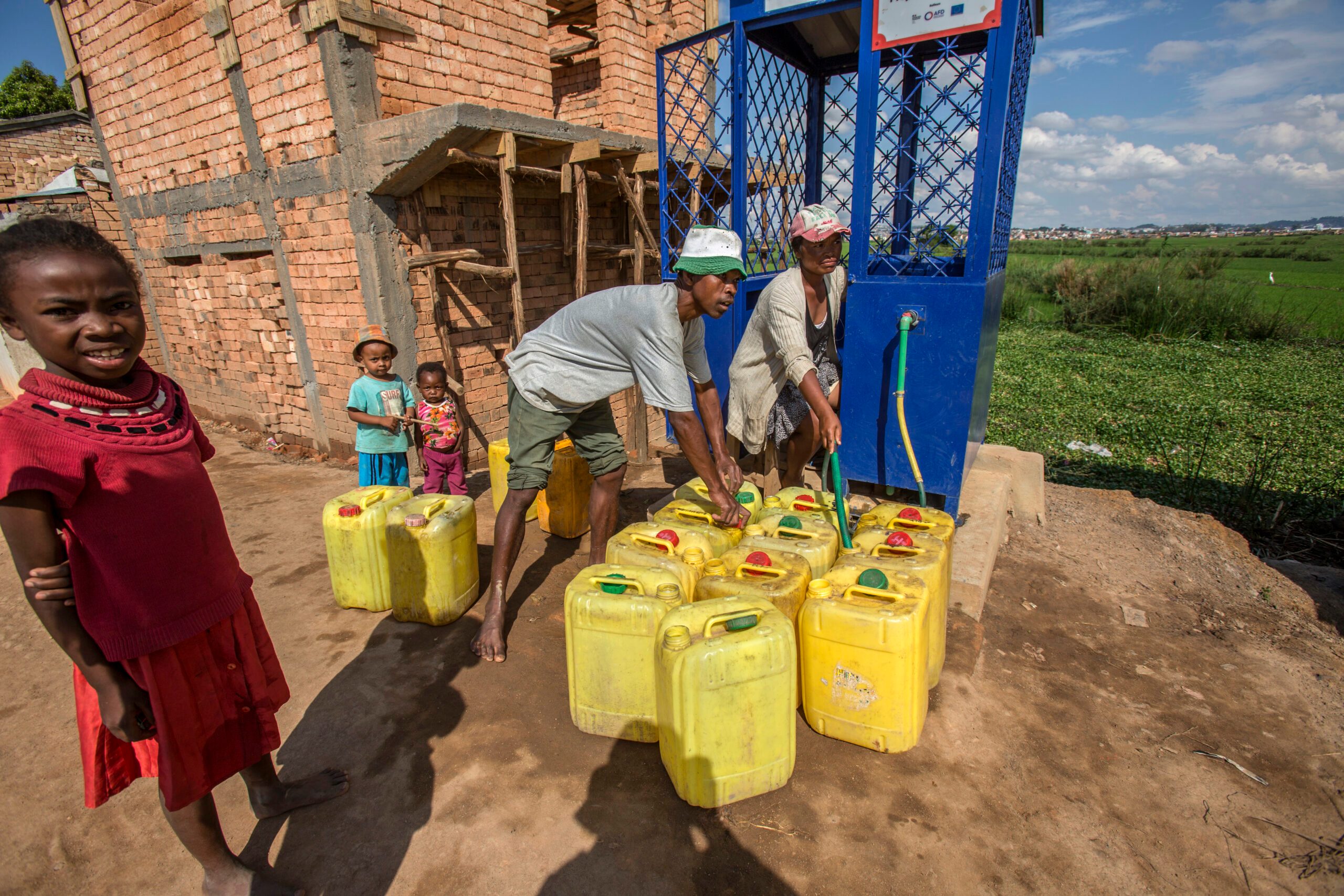 Villagers collect drinking water in Antananarivo, Madagascar. The region is facing drinking water shortages due to both drought and floods
