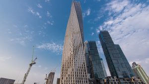 Accumulated losses for DSI, constructor of the Cayan Tower, Dubai, increased to AED5.3 billion in the first half of 2023 Cayan Tower Dubai Marina skyline blue sky