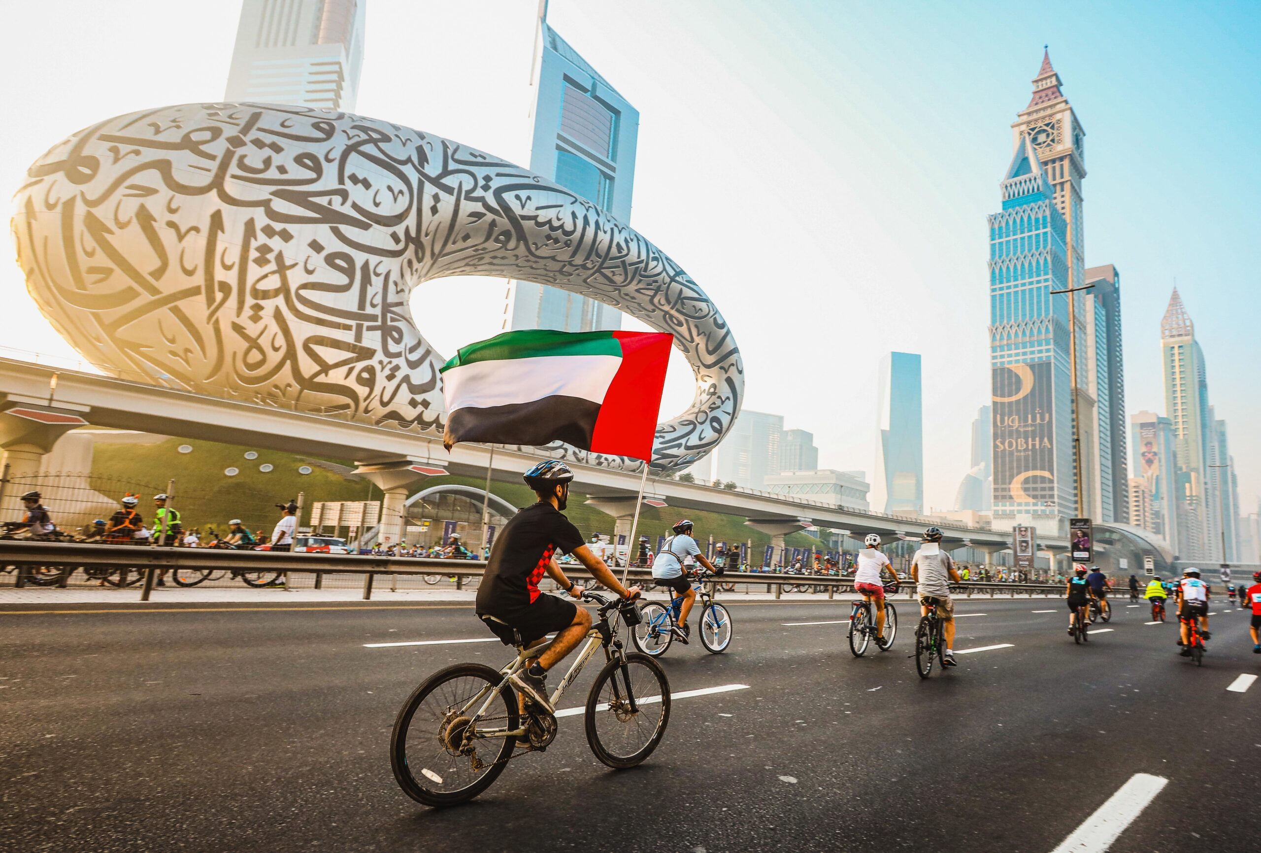 Cyclists take to the streets during Dubai Fitness Challenge. How many of them will feel a need for Aston Martin's luxury bicycle?