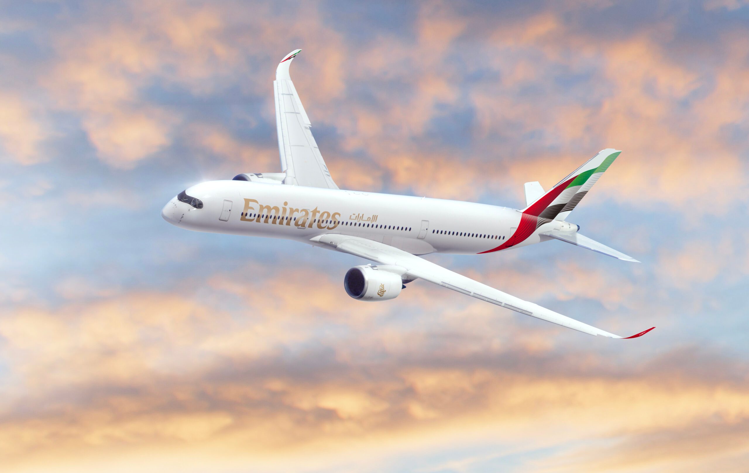 Emirates will be adding to its fleet, which currently consists of A380s and Boeing 777s (pictured) plane sky clouds Dubai, UAE November 16, 2021: A Boeing 777X aircraft on aerial display at the Dubai Airshow