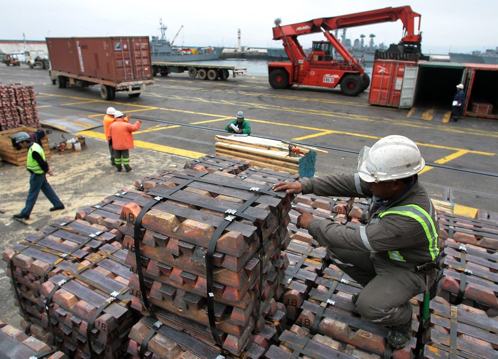 A worker checks a shipment of copper in Valparaiso, Chile, the world's largest copper producer; rising prices and tighter supply may encourage the Middle East to ramp up its own production