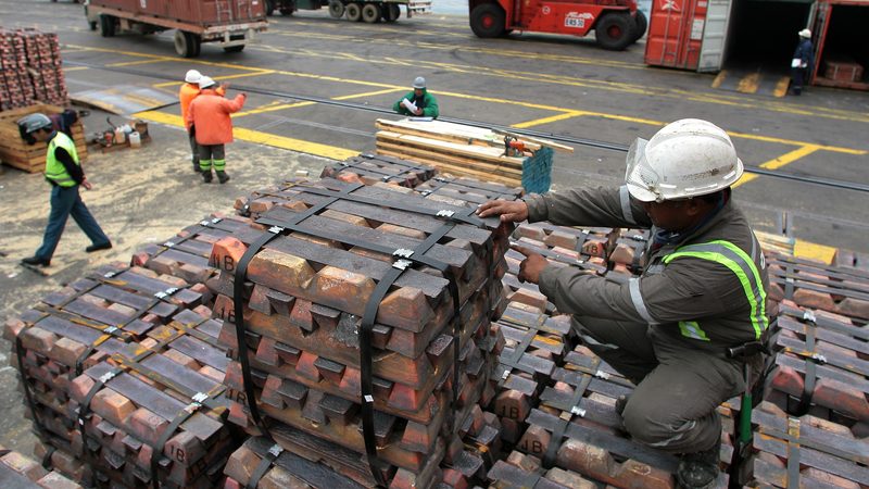 A worker checks a shipment of copper in Valparaiso, Chile, the world's largest copper producer; rising prices and tighter supply may encourage the Middle East to ramp up its own production
