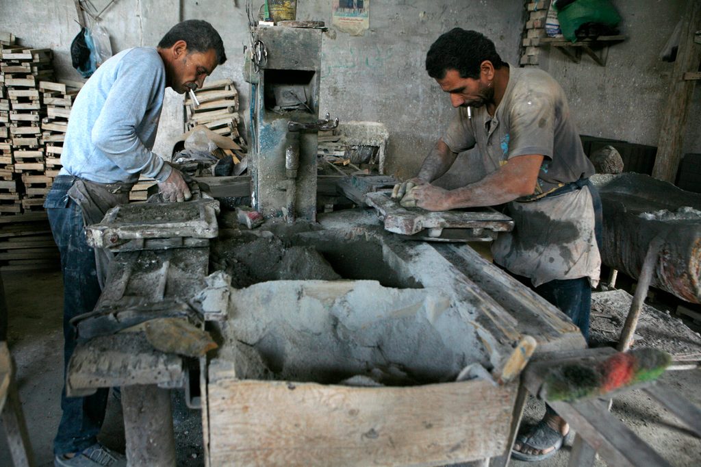 Workers make tiles at a small factory in Old Cairo. The EBRD provided €400 million to SMEs in Egypt in 2023.