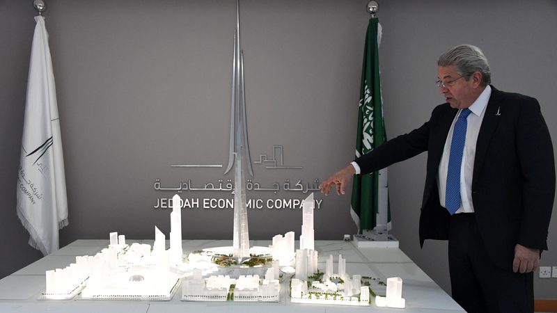 Jeddah Economic Company CEO Mounib Hammoud, shows a model of Jeddah Tower.