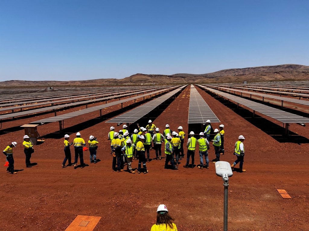 Visitors view Rio Tinto's 34MW solar farm at its Gudai-Darri iron ore plant. Western Australia is home to much of the country's mining, steel and fossil fuels industry