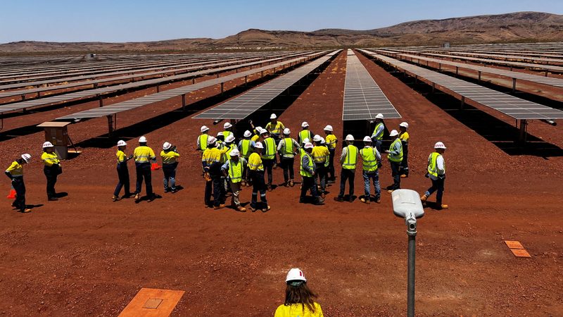 Visitors view Rio Tinto's 34MW solar farm at its Gudai-Darri iron ore plant. Western Australia is home to much of the country's mining, steel and fossil fuels industry
