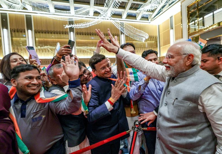 Members of Dubai's Indian community greet PM Narendra Modi at his hotel in the city. The UAE and India signed a Cepa in 2022