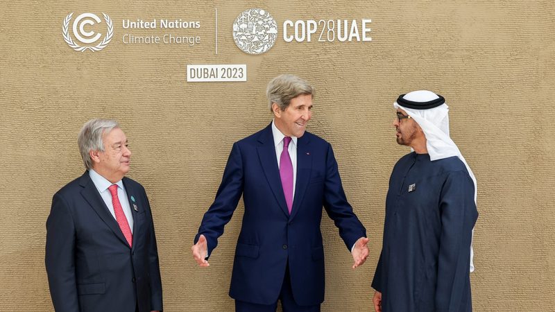 US special envoy John Kerry (centre), with United Nations chief António Guterres and the president of the UAE, Sheikh Mohamed bin Zayed