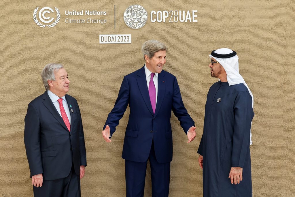 US special envoy John Kerry (centre), with United Nations chief António Guterres and the president of the UAE, Sheikh Mohamed bin Zayed