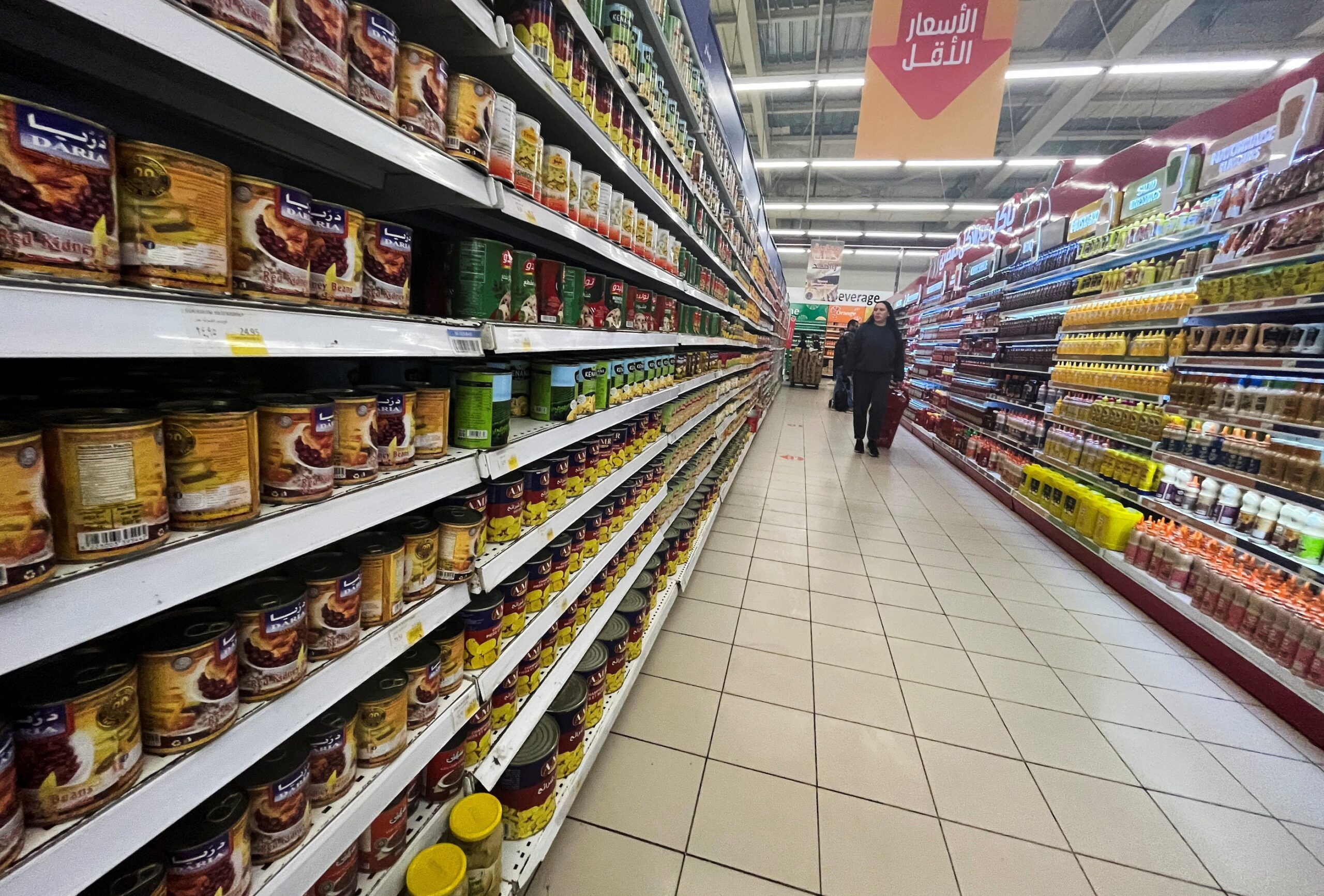 Shoppers look for bargains at a Cairo supermarket. Egypt's debt crisis. is worsening