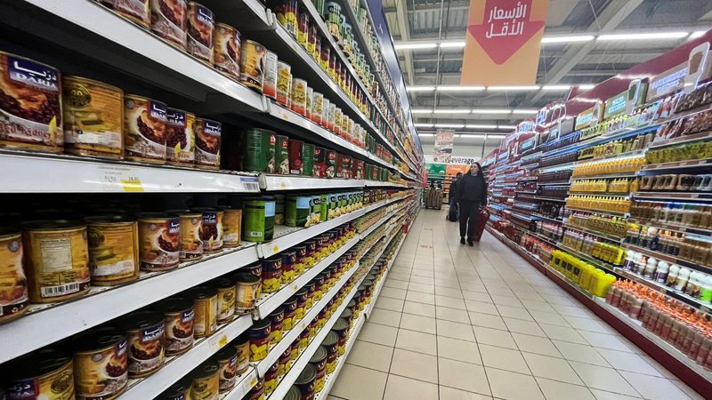 Shoppers look for bargains at a Cairo supermarket. Egypt's debt crisis. is worsening
