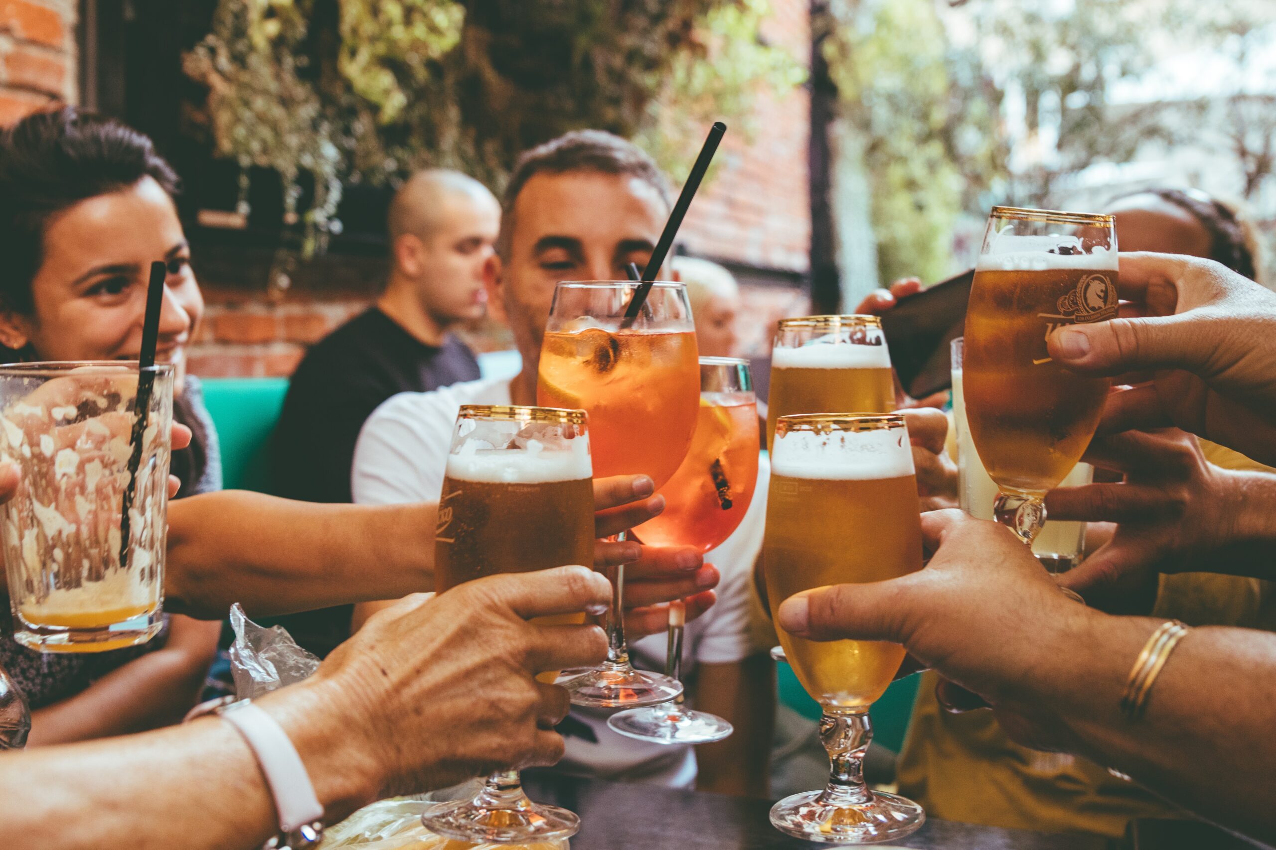 Beer drinkers. A 2021 law allows for alcohol to be made and consumed on licensed premises in Abu Dhabi