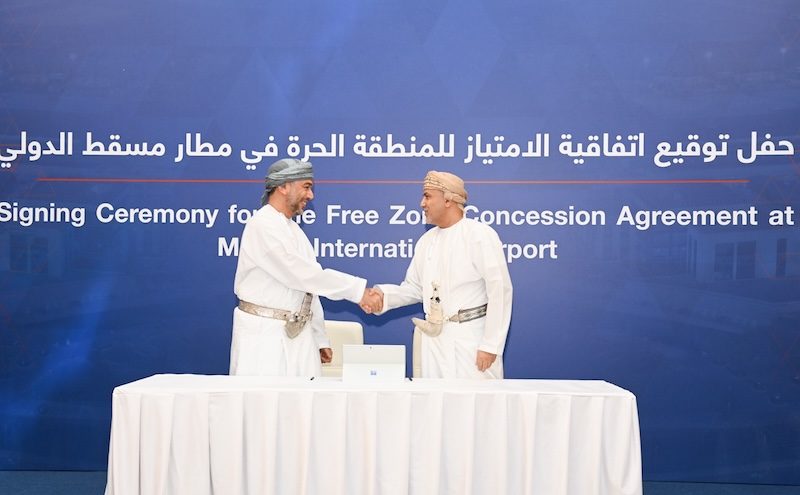 Ahmed Hassan Al Deeb, deputy chairman of Opaz and Abdulrahman Salim Al Hatmi, CEO of Asyad Group, sign the agreement for Muscat International Airport Free Zone