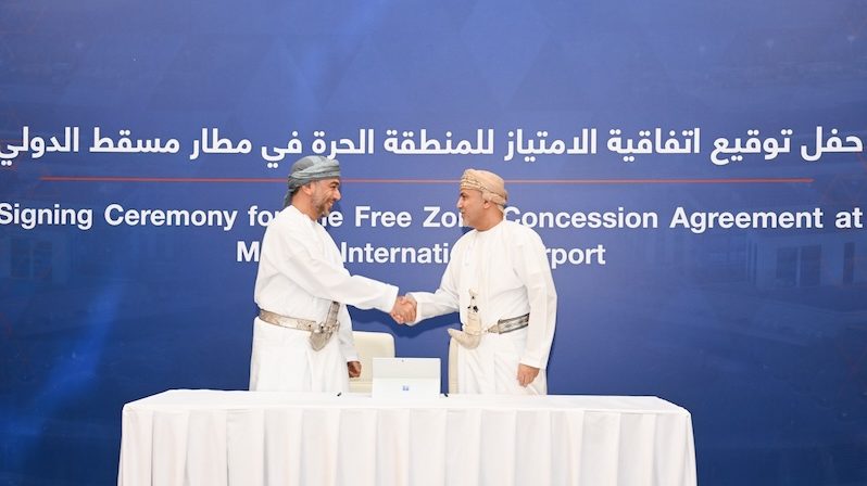 Ahmed Hassan Al Deeb, deputy chairman of Opaz and Abdulrahman Salim Al Hatmi, CEO of Asyad Group, sign the agreement for Muscat International Airport Free Zone