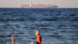 A container ship crosses the Gulf of Suez towards the Red Sea before entering the Suez Canal in Al-'Ain al-Sokhna, Egypt, in July