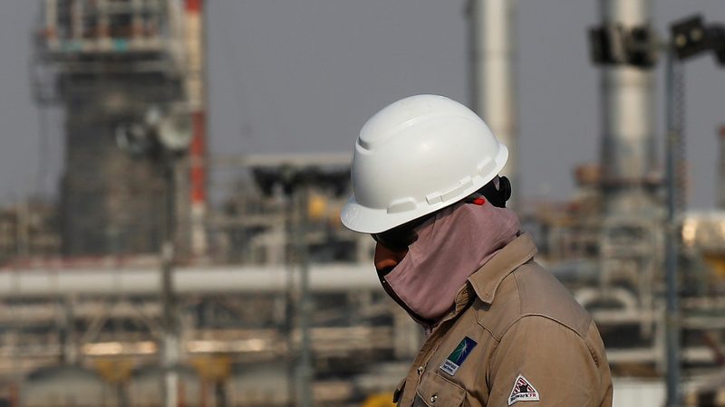 A Saudi Aramco worker at its oil facility in Abqaiq. Arab Light crude will cost $2 less per barrel in February