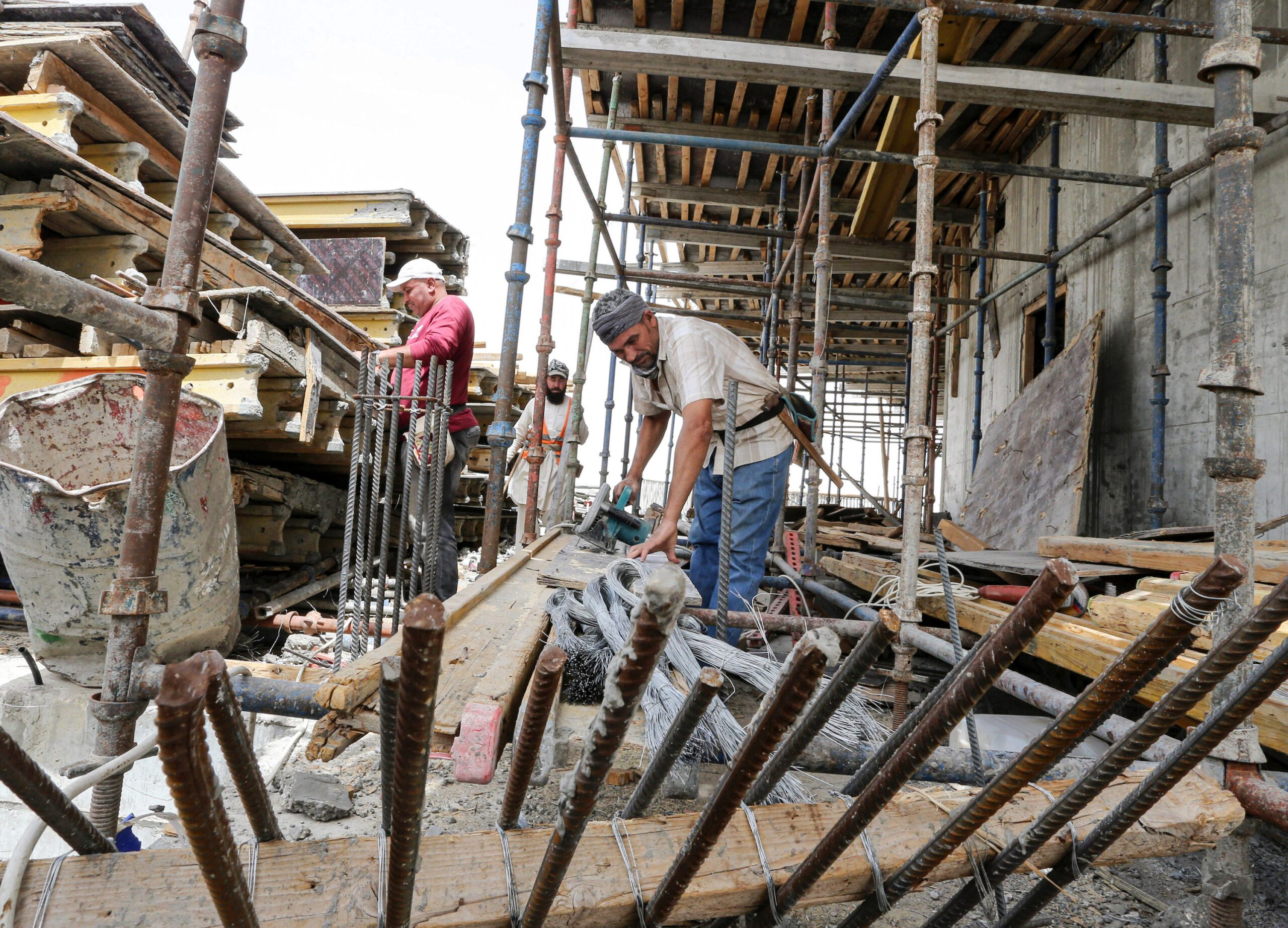 Building workers on site in Riyadh. Last mile funding opportunities 'remain very interesting', said one industry expert