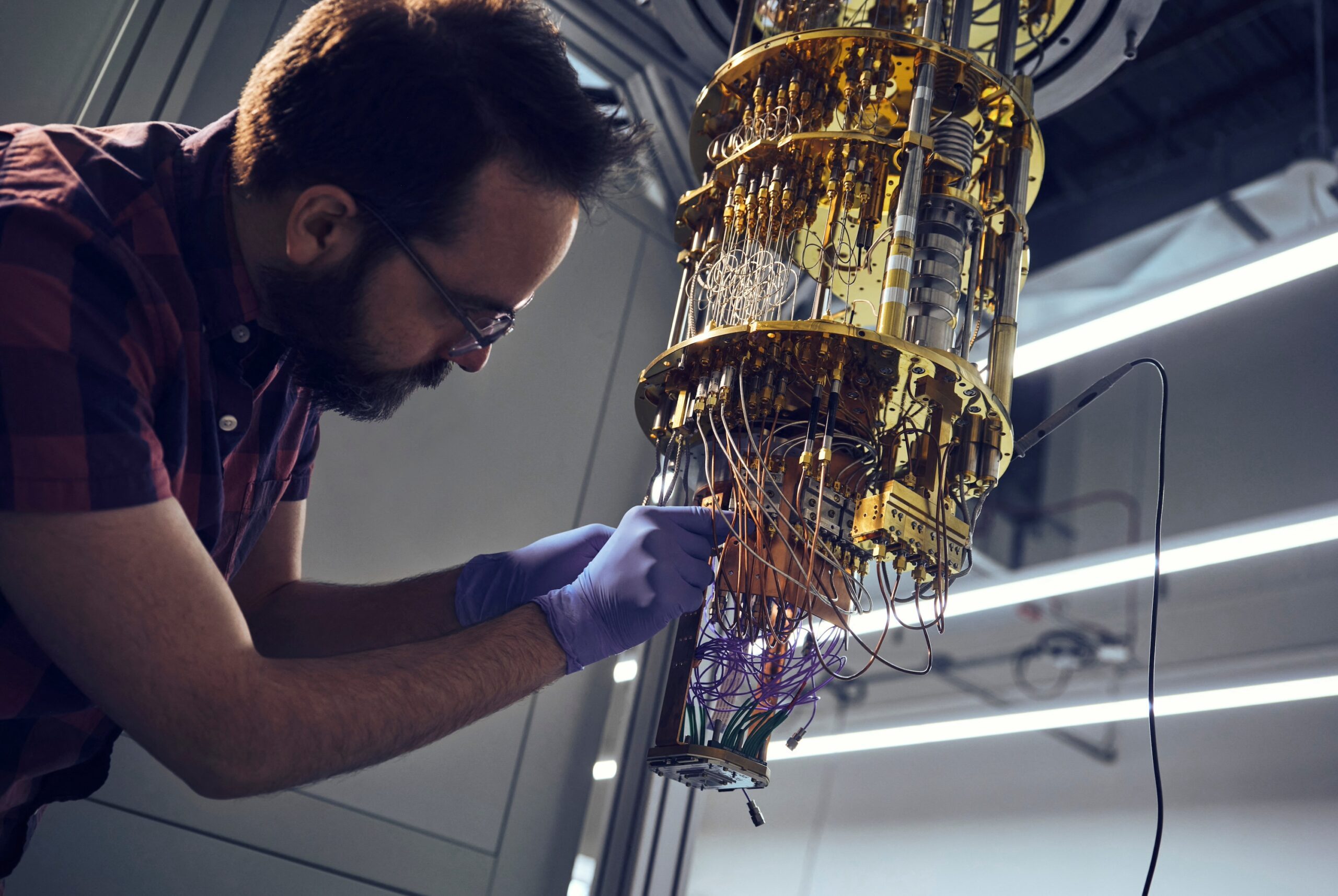 An engineer works on a cooling unit for a quantum computing system in a New York lab. The technology could crack 'traditional' encryption in seconds