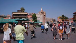 Tourists stroll through Jemma el Fna Square in Marrakech just days after an earthquake struck Morocco
