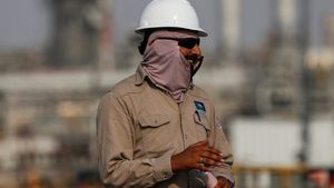 A Saudi Aramco employee at an oil facility in Abqaiq. The IMF downgraded Saudi Arabia's 2024 GDP forecast from 4% to 2.7%