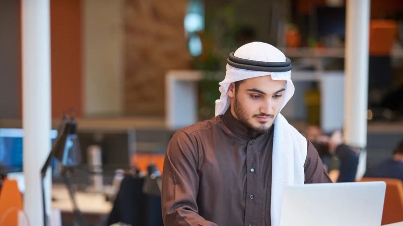 Arabian businessman working in modern office Additional funds will be used by Aramco Ventures to support startups in a variety of sectors, from tech to sustainable development