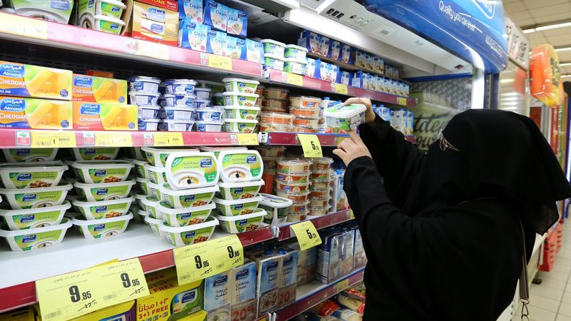 A Saudi woman shops for dairy products at a Riyadh supermarket. Wholesale price inflation for dairy products was 14.3% in December