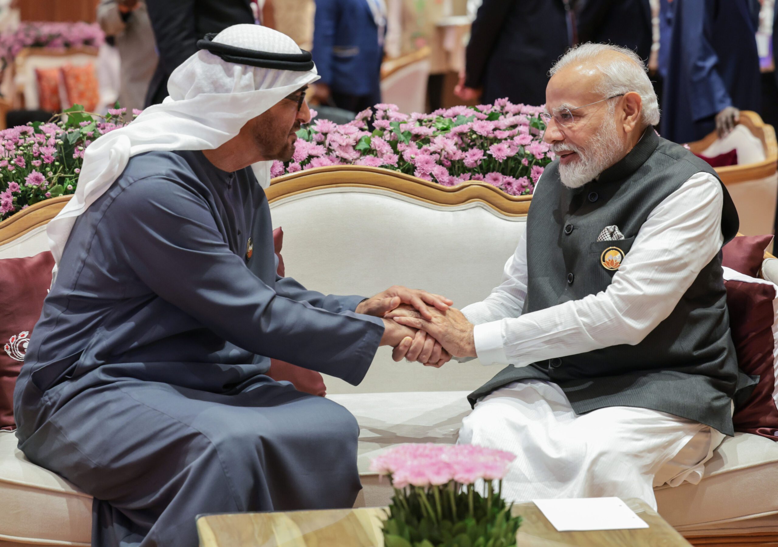 Sheikh Mohamed bin Zayed Al Nahyan and Narendra Modi, the leaders of the UAE and India, press palms at a meeting in New Delhi