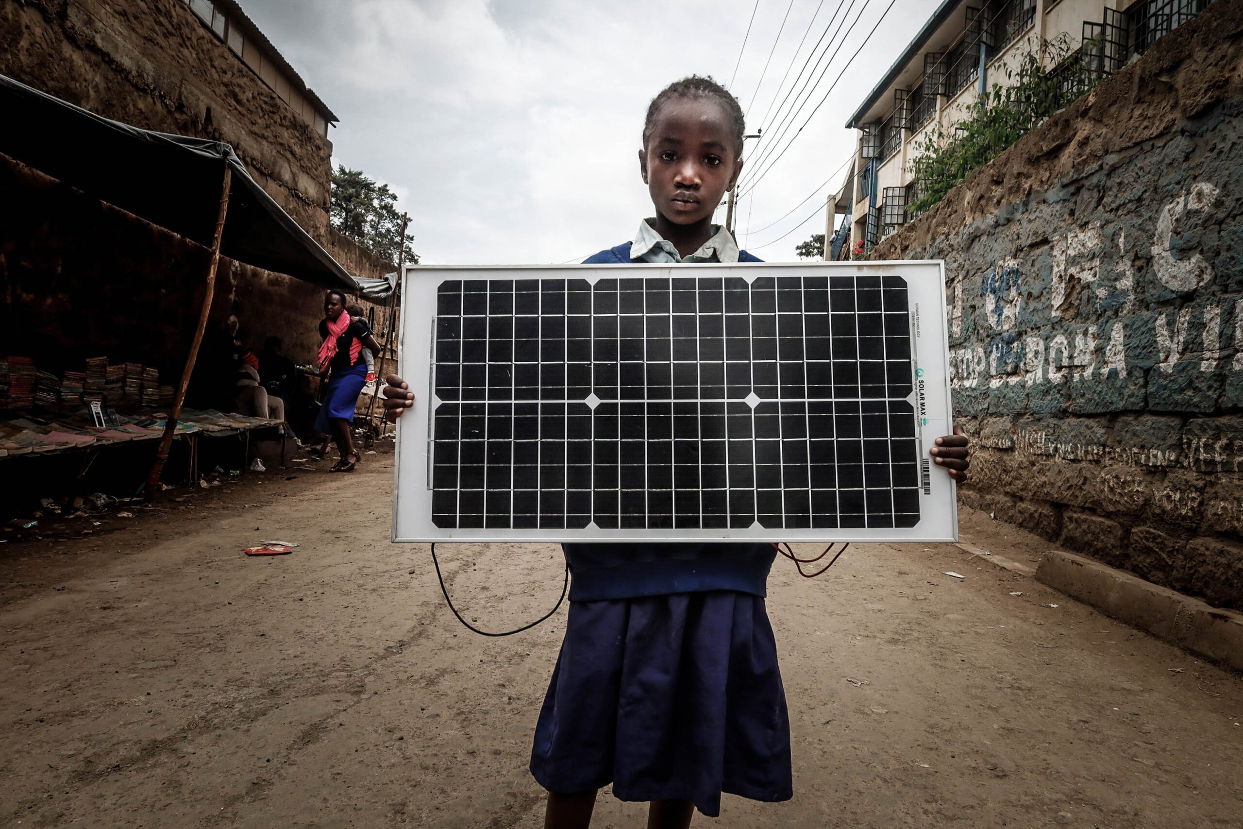 girl solar panel Kenya Dubai East Africa