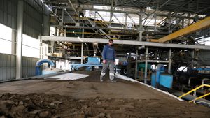 A worker at a phosphate production plant in Metlaoui, Tunisia. Phosphate accounts for 15% of Tunisia's exports