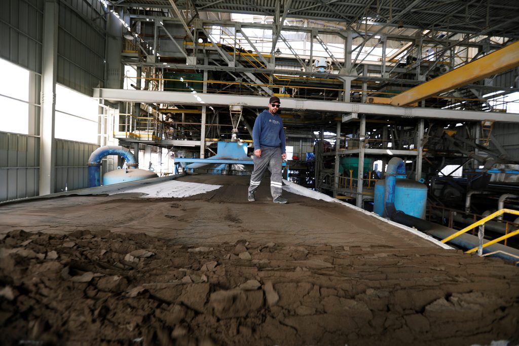 A worker at a phosphate production plant in Metlaoui, Tunisia. Phosphate accounts for 15% of Tunisia's exports