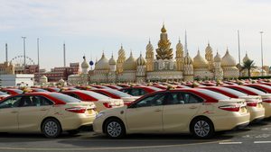 Dubai Taxi vehicles in front of Dubai Global Village. Taxis and limousines completed 46 million trips, up 8% year on year