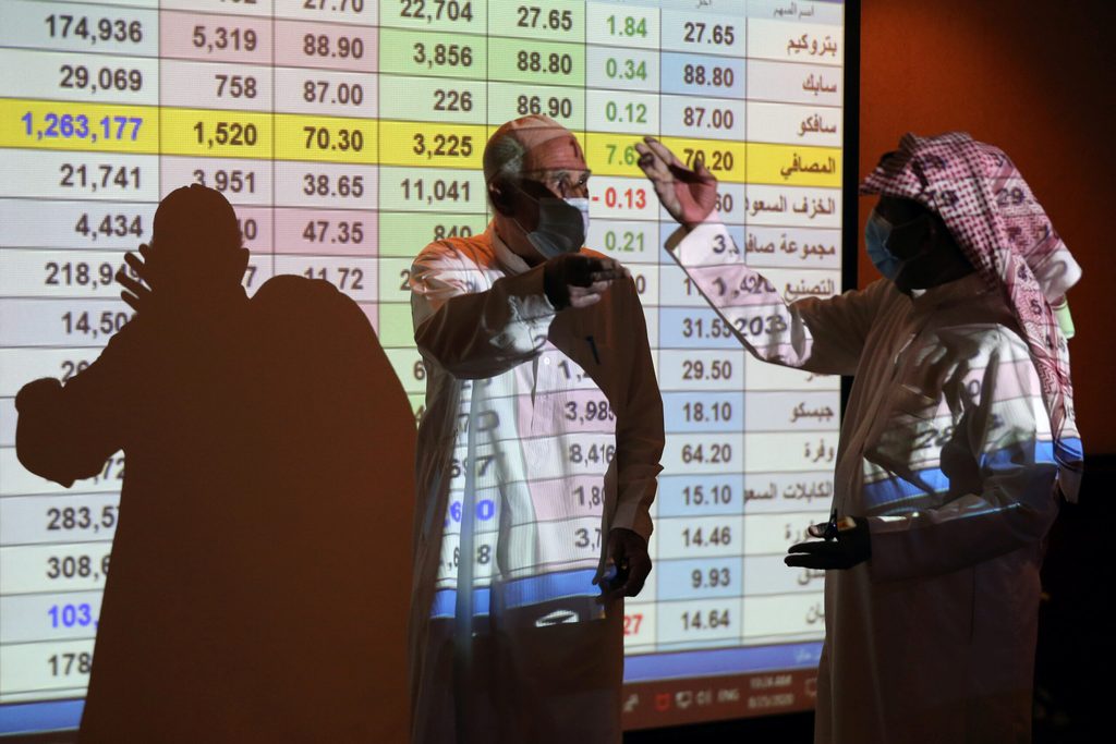 Traders at the Saudi stock market in Riyadh. Businesses from Saudi Arabia and the UAE are expected to dominate Middle East IPOs in 2024
