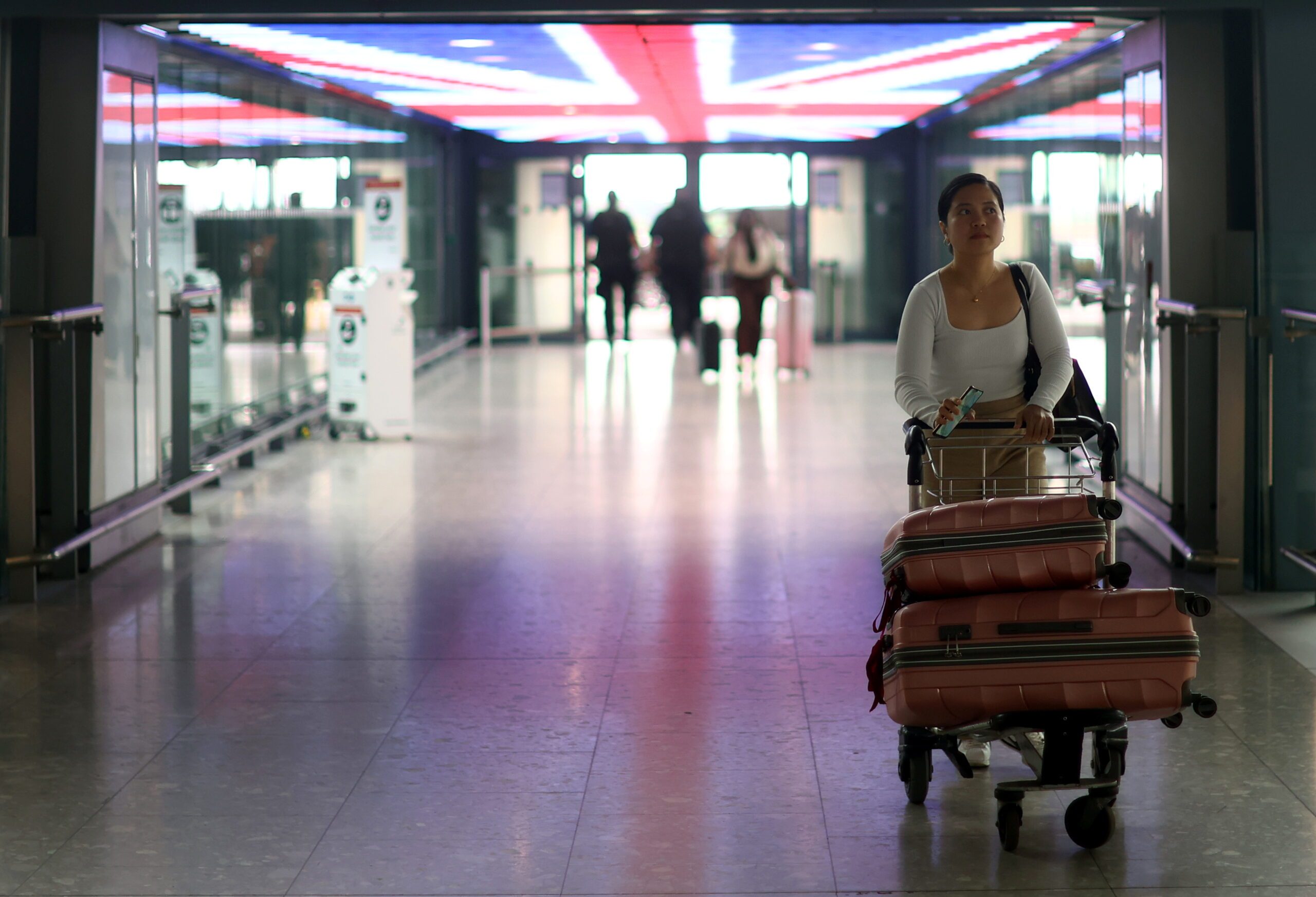 A passenger at Heathrow Airport's Terminal 5. The two-year visas for Saudi nationals will only cost £10