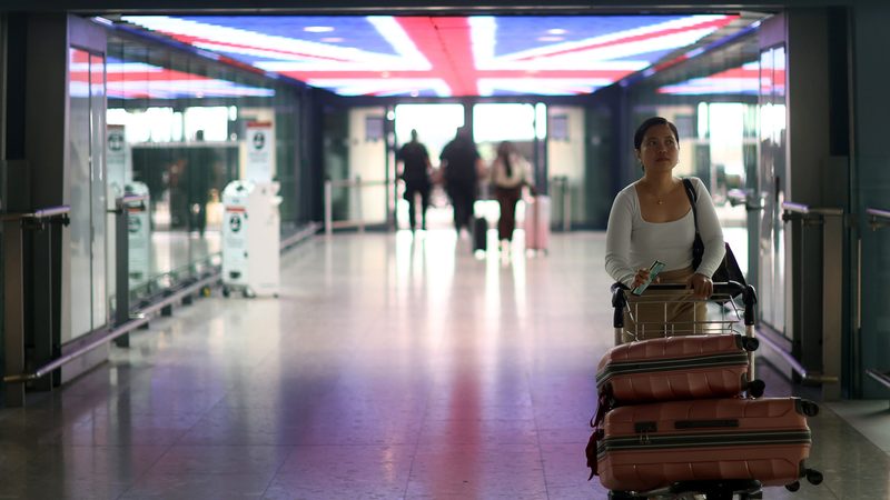 A passenger at Heathrow Airport's Terminal 5. The two-year visas for Saudi nationals will only cost £10